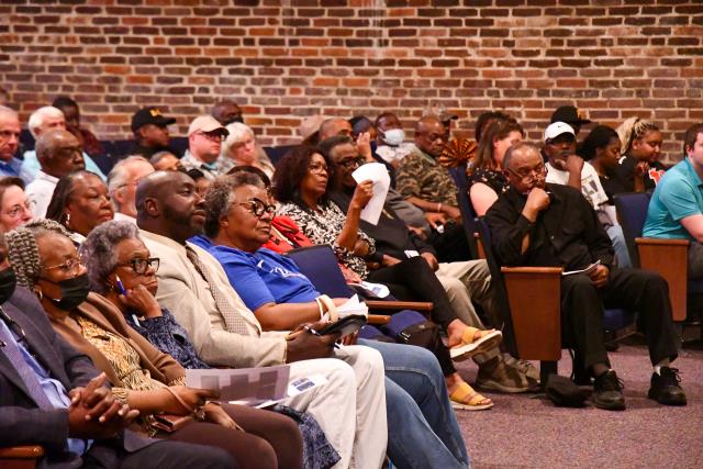 Townhall audience watches on as Representative Clyburn speaks.